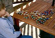 A boy with Asperger's playing with magnetic toys.
