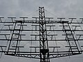 108 MHz reflective array antenna of AN-270 radar used during World War II consists of 32 half-wave dipole antennas in front of a reflecting screen.