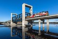Image 57A Sr1-pulled lumber train crossing the drawbridge along the Savonia railway in Kuopio, Finland (from Rail transport)
