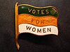 A Votes for Women lapel pin
