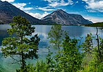 A mountain lake, surrounded by trees