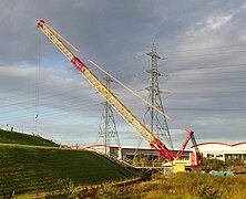 Weldex crane below embankment.