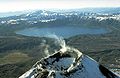 The lake-filled Akademia Nauk caldera, seen here from the north with Karymsky volcano in the foreground.