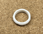 Aro ring, a white ring most commonly worn on the left middle finger