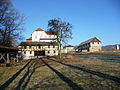 Schiefermühle, Remise mit Holzlege