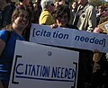 Chance meet of two {{citation needed}} signs at the rally