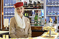 Emirates flight attendant in the A380 bar for Emirates
