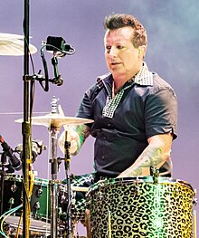 Tré Cool performing with Green Day in 2022