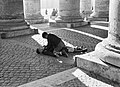 Boys playing among the columns of Piazza San Pietro, December 1937, Rome.