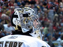 Photographie de Fleury avec le maillot blanc de Pittsburgh