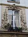 Détail de la fenêtre du 4, rue Monsieur-le-Prince.