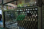 The mausoleum chamber, with the tomb cenotaph behind a fence