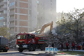 Removal of debris from the Yılmaz Erbek Apartman in November. Eleven people died.[89]