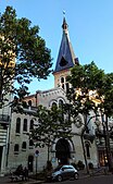 The bell tower and exterior of St. Antoine Church