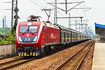 HXD1D-0286 pulling a rapid passenger train at Nanjing East Railway Station.