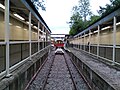 A walkway around the end of the platform 1 track provides step-free access to platforms 2 and 3