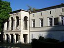 Hans-Otto-Theater, ehemaliges Gesellschaftshaus „Zum Alten Fritz“ (Vorderhaus mit Kassenhalle und Gedenktafel zum Vereinigungsparteitag von KPD und SPD des Landes Brandenburg zur SED)