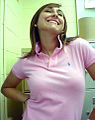 Image 4Woman wearing a polo shirt with a popped collar. (from 1990s in fashion)