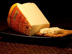 Photographie d’une tranche de fromage.