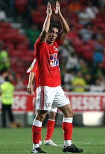 Rui Costa, clapping his hands over his head after scoring a goal