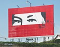A billboard with Hugo Chávez's eyes and signature in Guarenas