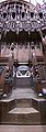 14th century choir stall with canopy, note misericord and the delicately carved bench ends.