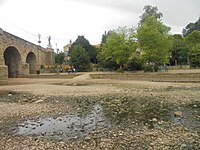 The River Wharfe at Wetherby, West Yorkshire by Wetherby Bridge having largely dried up
