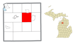 Location within Kalkaska County (red) and a portion of the administered community of Manistee Lake (pink)