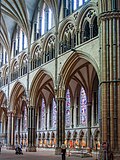 Pointed arches in the arcades, triforium, and clerestory of Lincoln Cathedral (1185–1311)