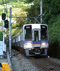 Silver-colored electric train