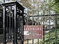 Photo of the Historic Landmark sign on the entrance to Roslyn Place