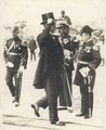 Brazilian President Washington Luís wearing morning dress and a top hat during a military ceremony (late 1920s−early 1930s).