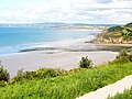 La plage du Ris et la pointe de Kastell ar Bardeg ; au second plan, la plage de Sainte-Anne-la-Palud et à l'arrière-plan le Ménez Hom.