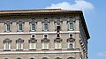 Image 30The Apostolic Palace (Palazzo Apostolico), the official residence of the Pope. Here, Benedict XVI is at the window marked by a maroon banner hanging from the windowsill at centre. (from Vatican City)