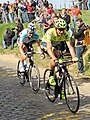 Filippo Pozzato and Tom Boonen riding up Oude Kwaremont in the 2012 Tour of Flanders