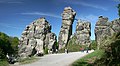 Image 5 Externsteine Photo credit: Daniel Schwen The Externsteine, a distinctive rock formation located in the Teutoburger Wald region of northwestern Germany, are a popular tourist attraction. Stairs and a small bridge connecting two of the rocks lead to the top.