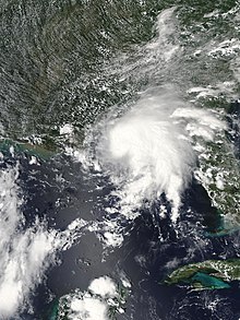 A visible satellite image of a tropical storm prior to making landfall near the Alabama–Mississippi border on September 4