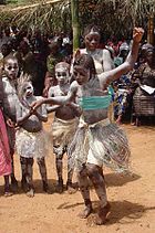 Students celebrate with traditional dancing in Koindu, Kailahun District, Sierra Leone