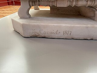 Signature de Carnielo sur la base de la sculpture.