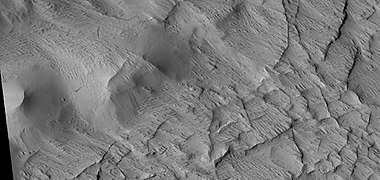 Close view of contact between ridge network and overlying layer, as seen by HiRISE under HiWish program