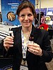 Heather Willauer holding samples of synthetic fuel