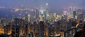 Humans can now change their environment to solve problems. The many tall buildings in Hong Kong are an example of people solving the problem of too many people in one place.