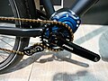 Chain tensioner for a bicycle with an internal gearbox