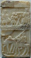 Sabaean alabaster grave stele of ʿIglum, son of Saʿad Illat Qaryot with two scenes of the deceased (Louvre)