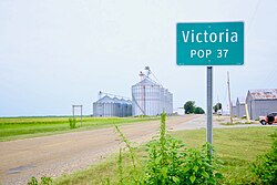 Sign along AR 158 with 2010 population