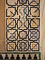 Zellij band with interlacing motif at the entrance of the Comares Palace of the Alhambra (14th century)