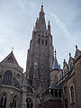 The Basilica of Our Lady of Bruges, Belgium has a statue of the Madonna by Michelangelo.