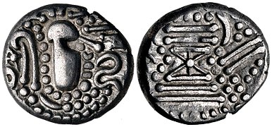 A Chaulukya-Paramara coin, c. 950-1050 CE. Stylized rendition of Chavda dynasty coins: Indo-Sassanian style bust right; pellets and ornaments around / Stylised fire altar; pellets around.[24]