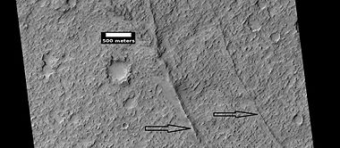 Possible dikes, as seen by HiRISE under HiWish program. Arrows point to possible dikes, which appear as relatively straight, narrow ridges.