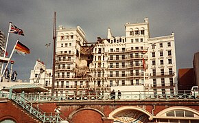 The Grand Hotel with a large hole in the front, caused by the explosion